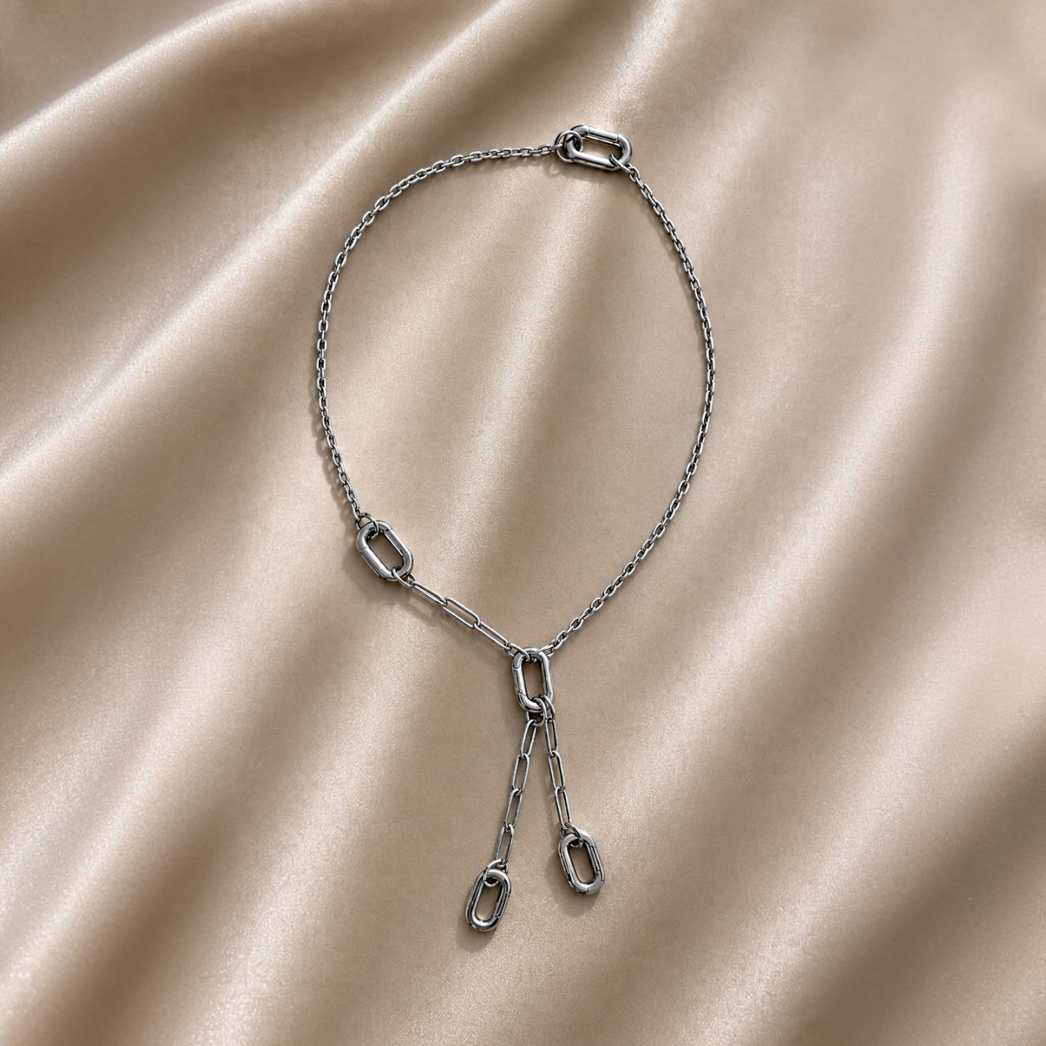 HOUSE OF EVEN Orbit Connector Necklace in polished silver stainless steel with three removable modular chain links.